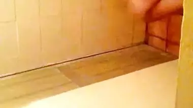 Girl spying on her stepmom having nude bath