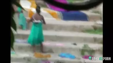 Local guy caught sexy Indian aunts take a bath outdoor in the river. era desi