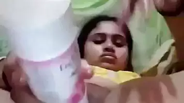 Desi babe using room freshener bottle to masturbate